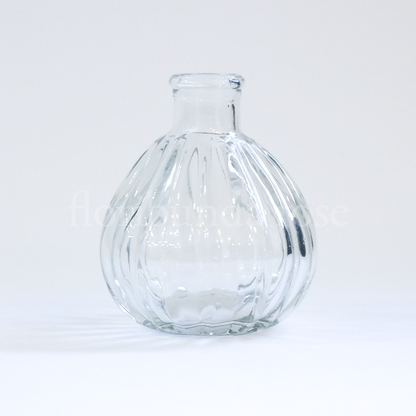 Bulb shaped Ribbed Glass Bud Vase