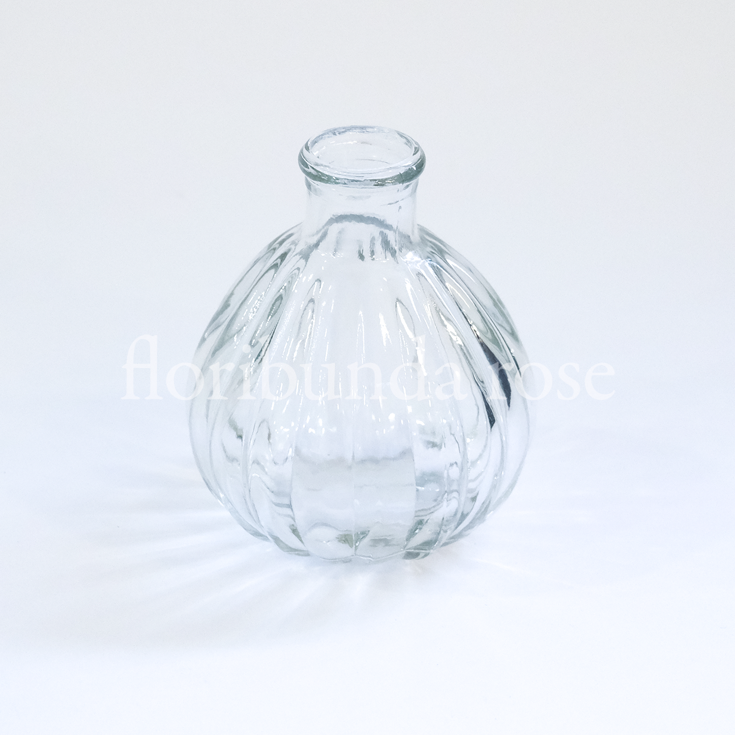 Bulb shaped Ribbed Glass Bud Vase